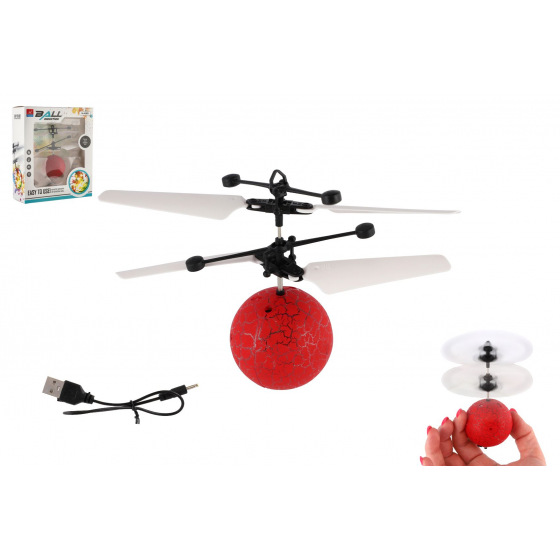 Vrtulníková koule létající plast 13x11cm svítící reagující na pohyb ruky,USB kabelem červená v krab.